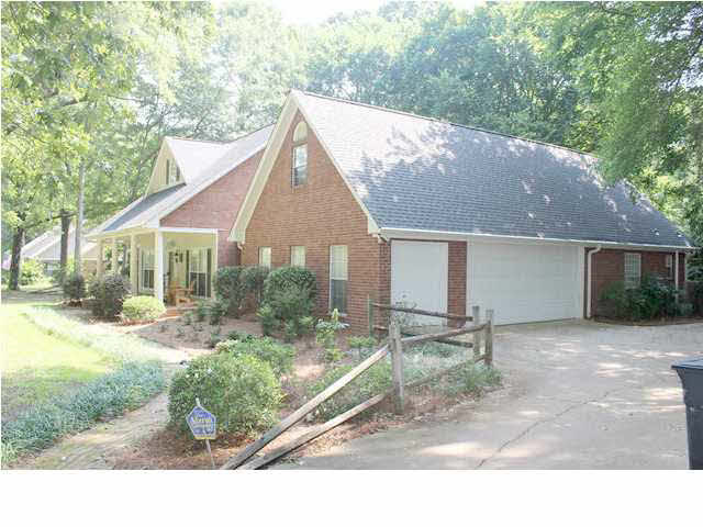 129 Random Oak Cove Raymond, MS 39154 - Photo 4 of 43 Side view from Driveway