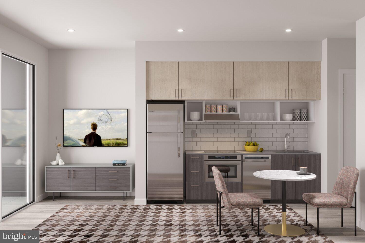 1314 Spring Garden Street, Unit 326 Philadelphia, PA 19123 - Photo 10 of 26 a dining room with table and chairs