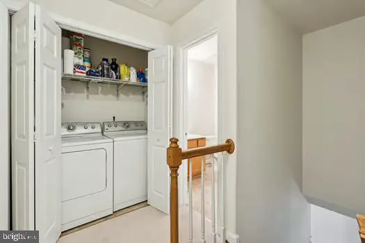 a view of a storage & utility room with a sink