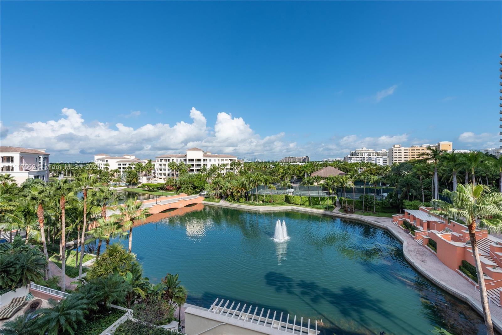 765 Crandon Boulevard, Unit 504 Key Biscayne, FL 33149 - Photo 2 of 46 a view of a lake with a city