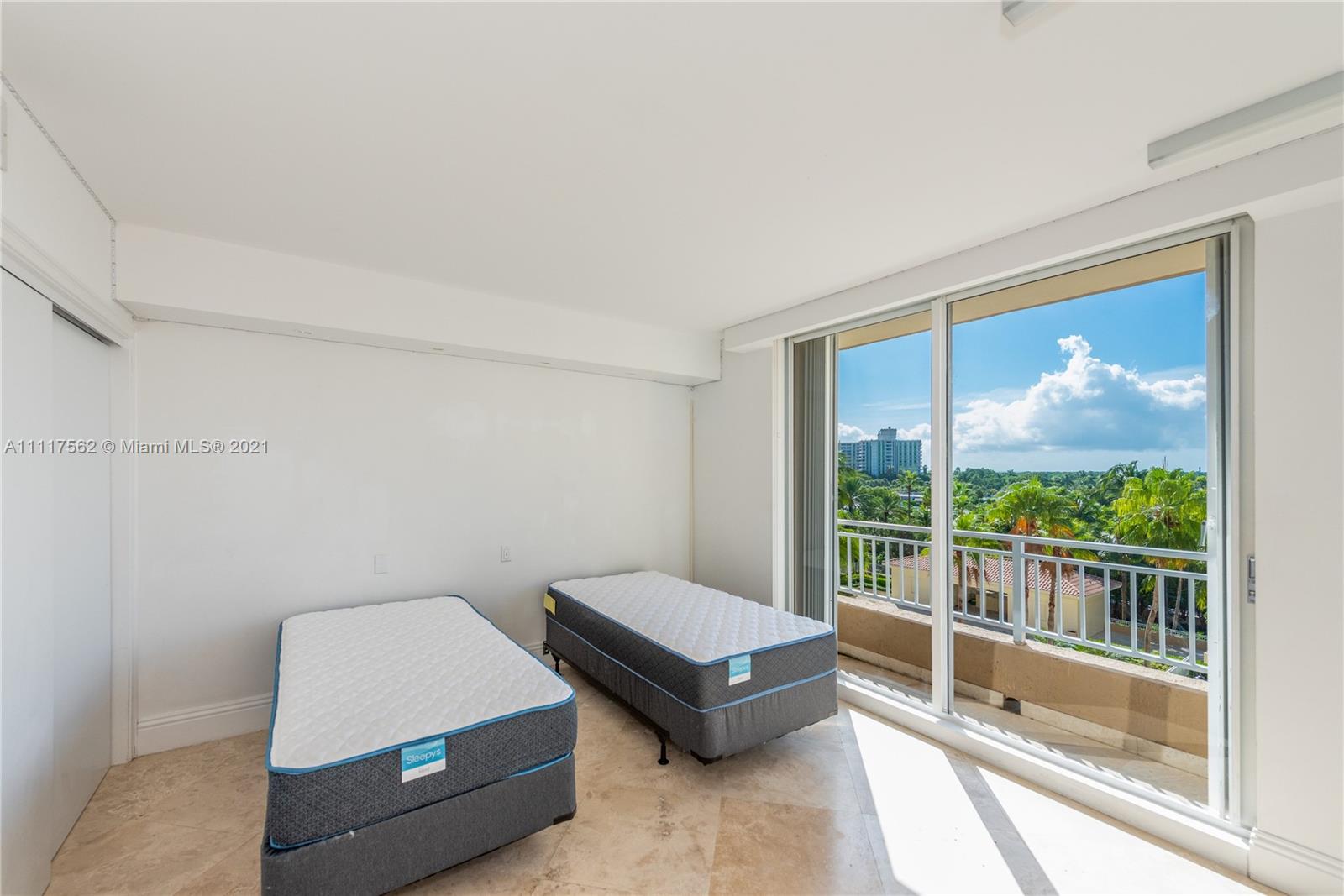 765 Crandon Boulevard, Unit 504 Key Biscayne, FL 33149 - Photo 17 of 46 a living room with furniture
