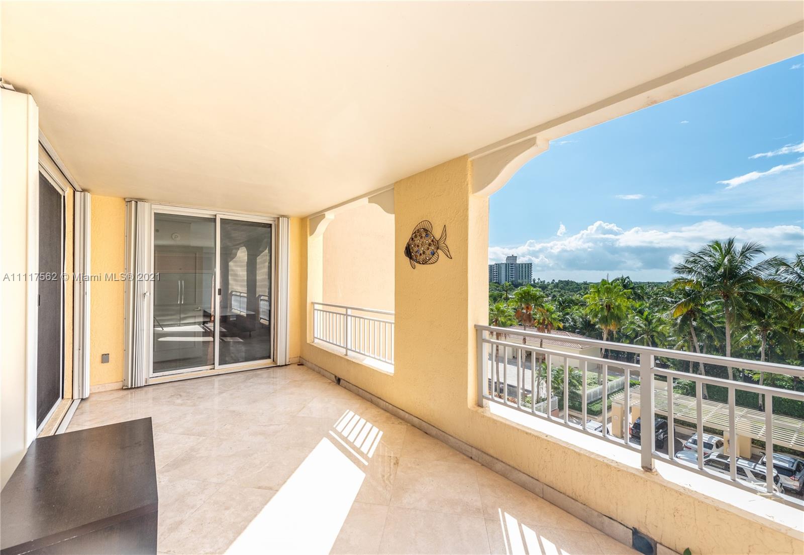 765 Crandon Boulevard, Unit 504 Key Biscayne, FL 33149 - Photo 22 of 46 a view of a balcony with lake view