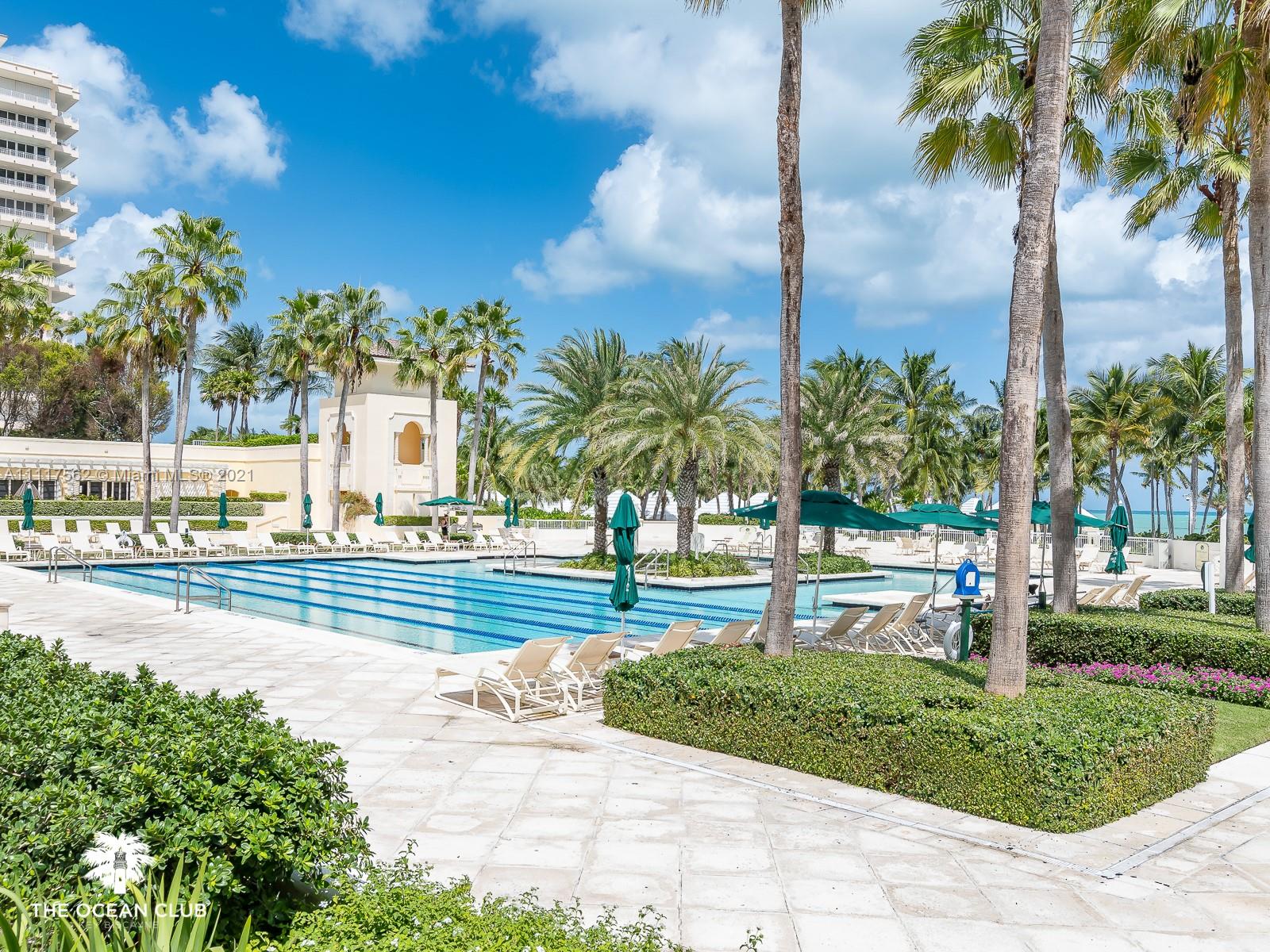 765 Crandon Boulevard, Unit 504 Key Biscayne, FL 33149 - Photo 38 of 46 a view of a yard and palm trees