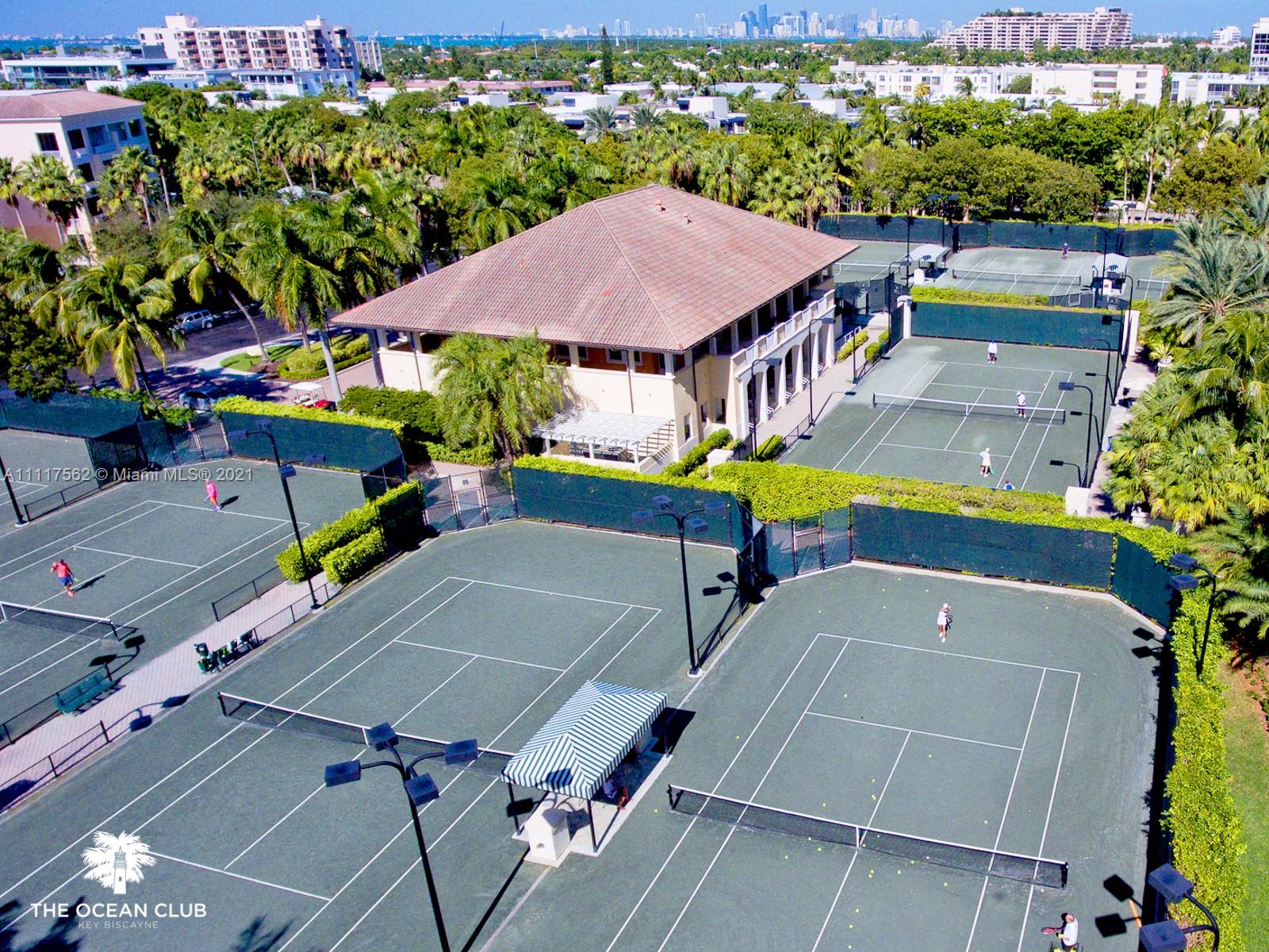 765 Crandon Boulevard, Unit 504 Key Biscayne, FL 33149 - Photo 44 of 46 an aerial view of a house with swimming pool and outdoor seating