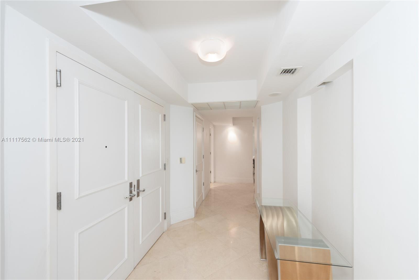 765 Crandon Boulevard, Unit 504 Key Biscayne, FL 33149 - Photo 7 of 46 a view of a room with wooden floor