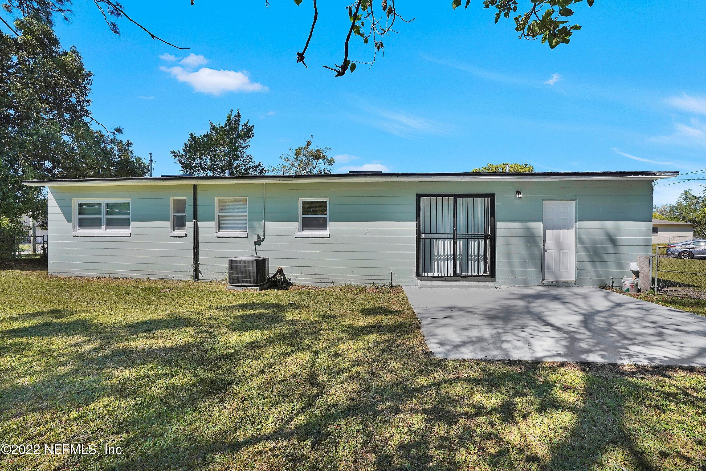 6631 Champlain Road Jacksonville, FL 32208 - Photo 23 of 25 a house view with a backyard space