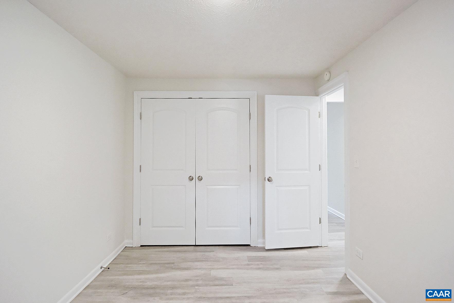 616 Rockcreek Road, Unit B Charlottesville, VA 22903 - Photo 7 of 13 a view of an empty room