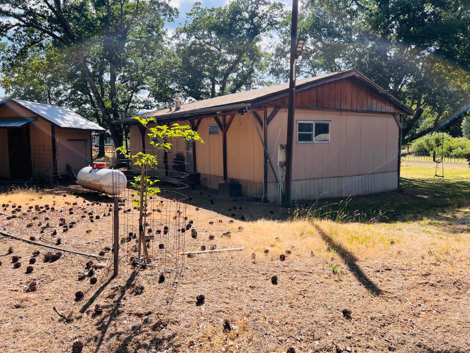 70 Oak Avenue Hayfork, CA 96041 - Photo 18 of 49 a view of a house with wooden fence