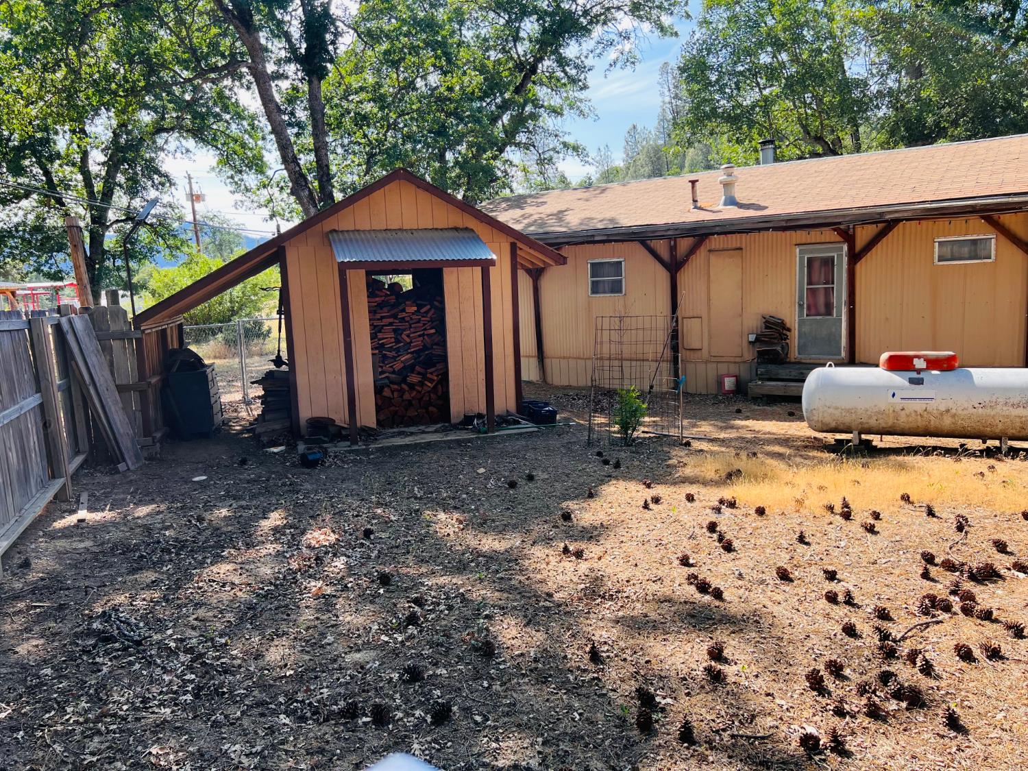 70 Oak Avenue Hayfork, CA 96041 - Photo 20 of 49 a front view of a house with garden