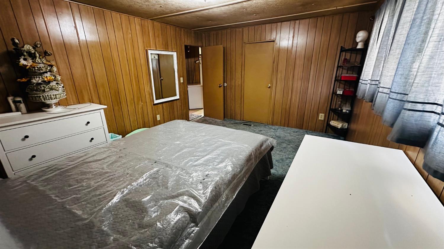 70 Oak Avenue Hayfork, CA 96041 - Photo 35 of 49 a bedroom with a bed and a dresser