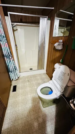 a kitchen with a stove a sink and cabinets