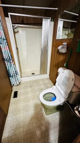 a kitchen with a stove a sink and cabinets