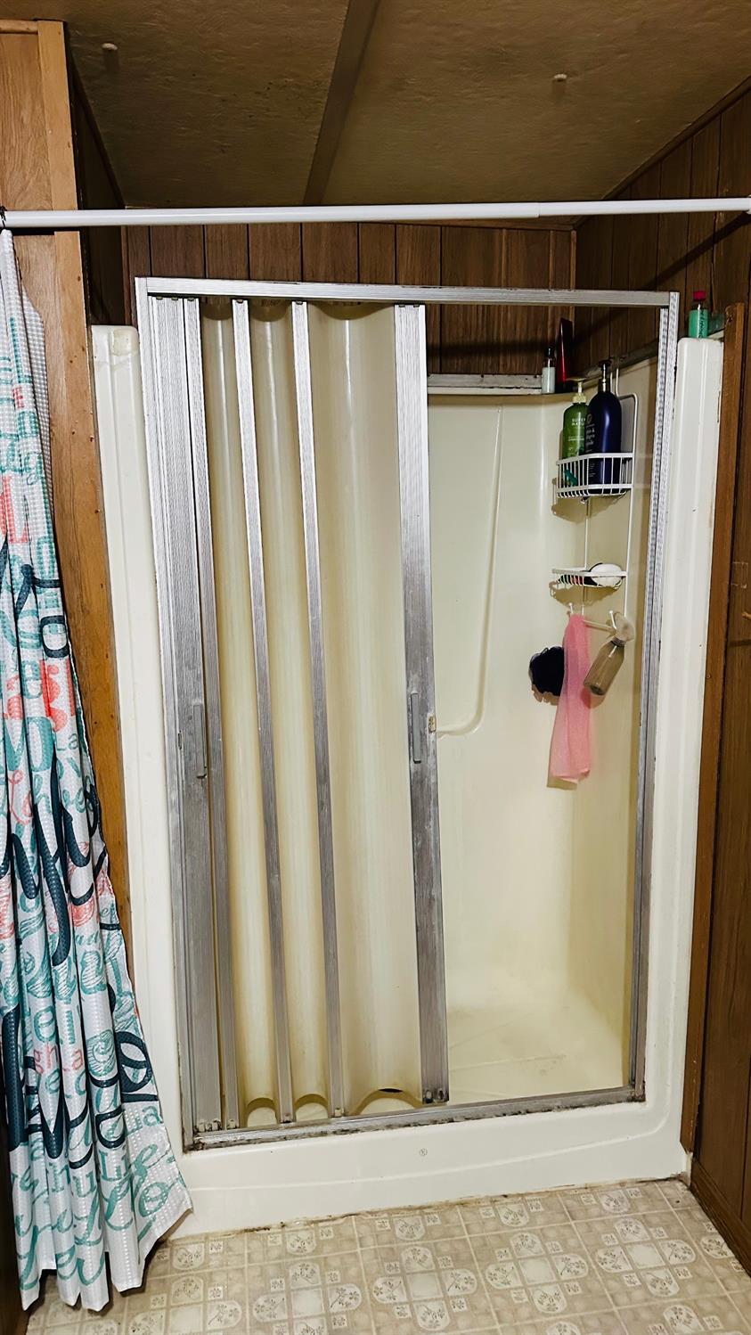 70 Oak Avenue Hayfork, CA 96041 - Photo 40 of 49 a view of walk in closet with clothes and shoes