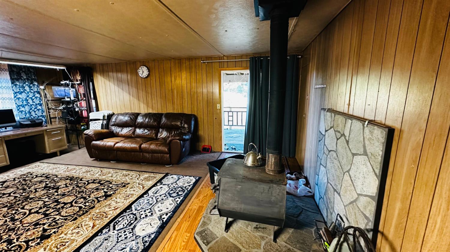 70 Oak Avenue Hayfork, CA 96041 - Photo 43 of 49 a living room with furniture and a rug