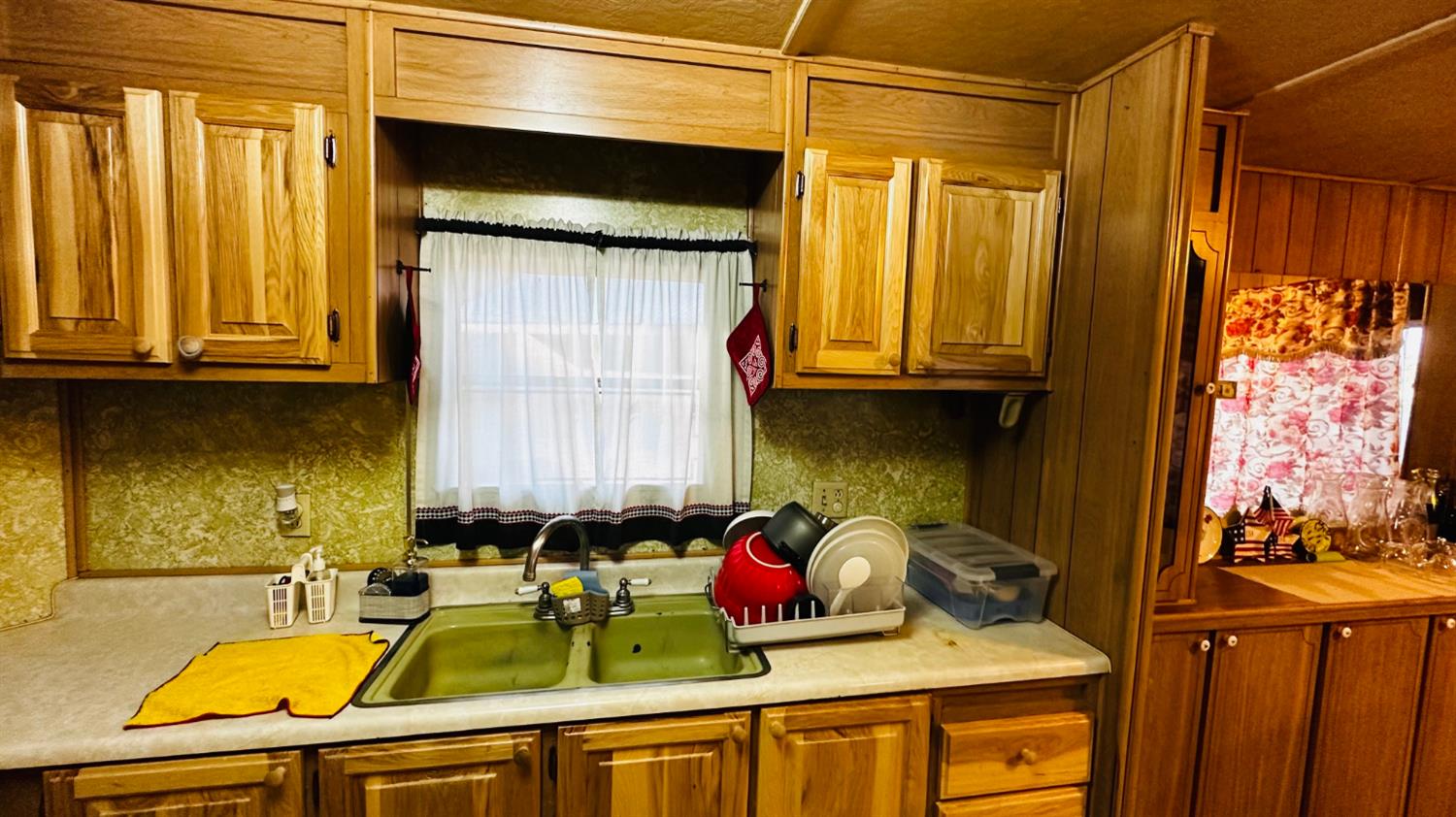 70 Oak Avenue Hayfork, CA 96041 - Photo 44 of 49 a kitchen with a sink stove and cabinets