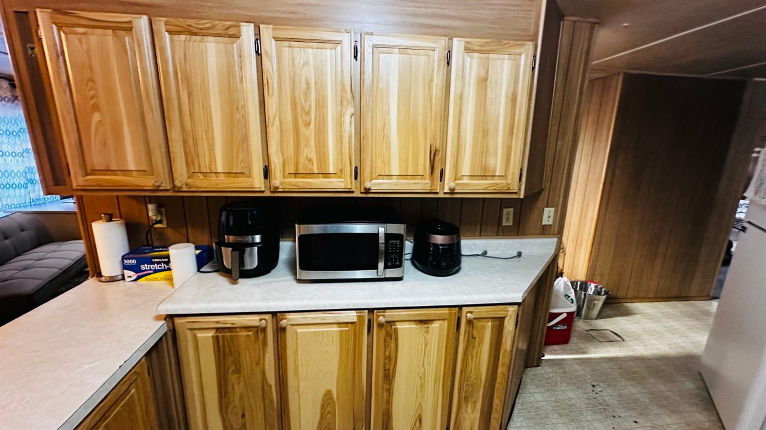 70 Oak Avenue Hayfork, CA 96041 - Photo 45 of 49 a kitchen with stainless steel appliances granite countertop a sink a stove and a microwave