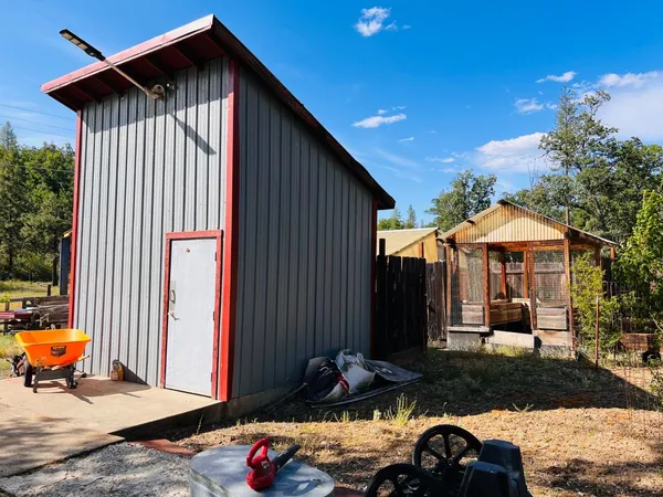 a front view of a house with a patio