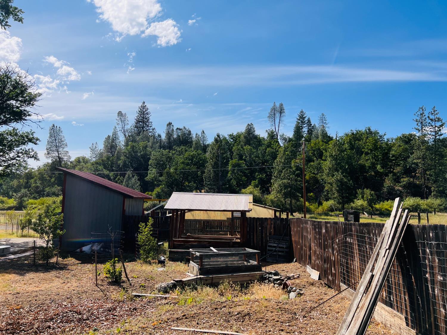 70 Oak Avenue Hayfork, CA 96041 - Photo 10 of 49 a view of a terrace with a barbeque