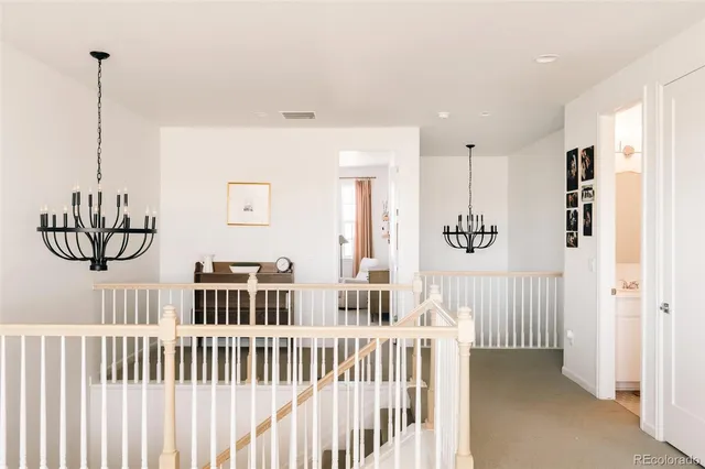 a view of a hallway with windows