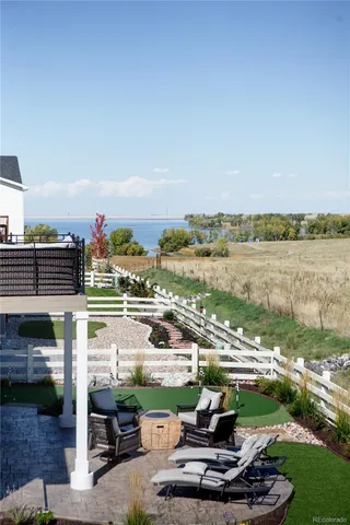 a view of a lake with a yard