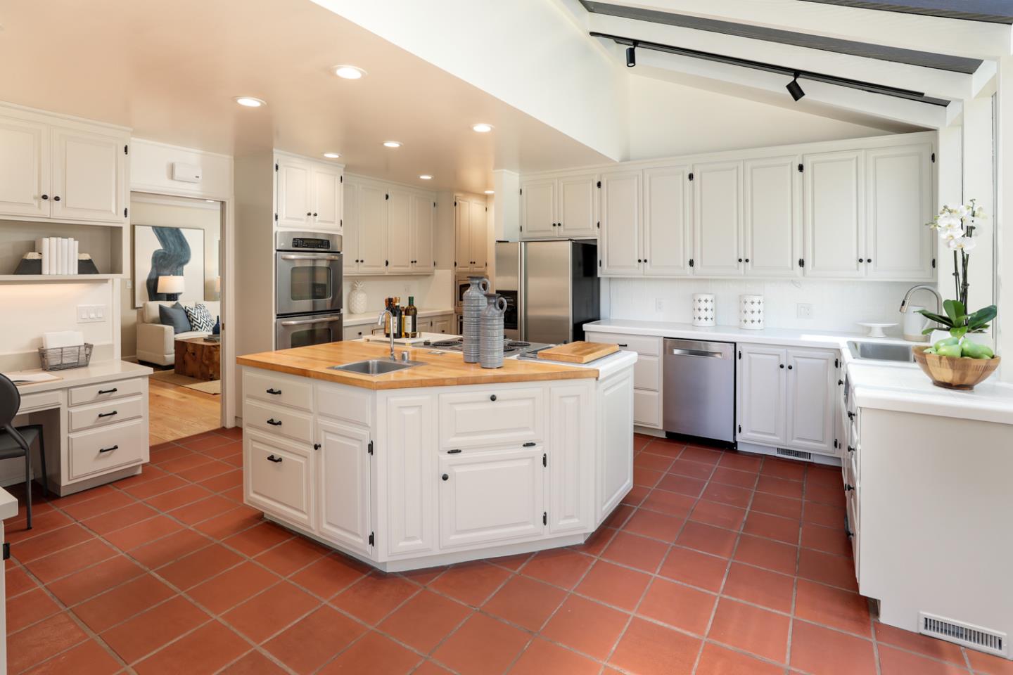 1869 Appletree Lane Mountain View, CA 94040 - Photo 11 of 35 a kitchen with stainless steel appliances a sink window and cabinets