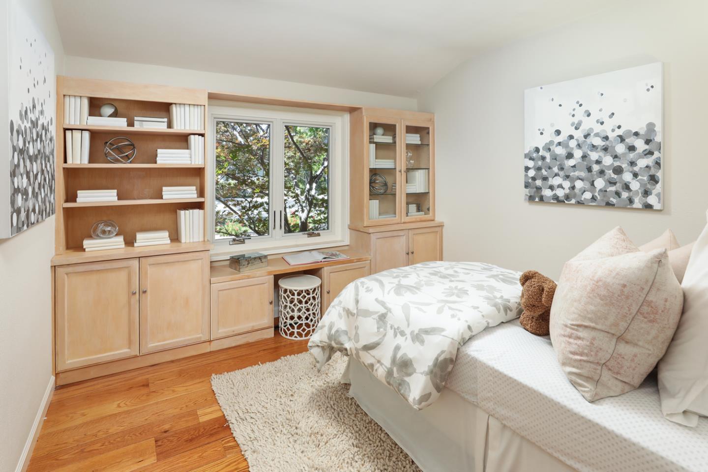 1869 Appletree Lane Mountain View, CA 94040 - Photo 14 of 35 a bedroom with a bed and a window