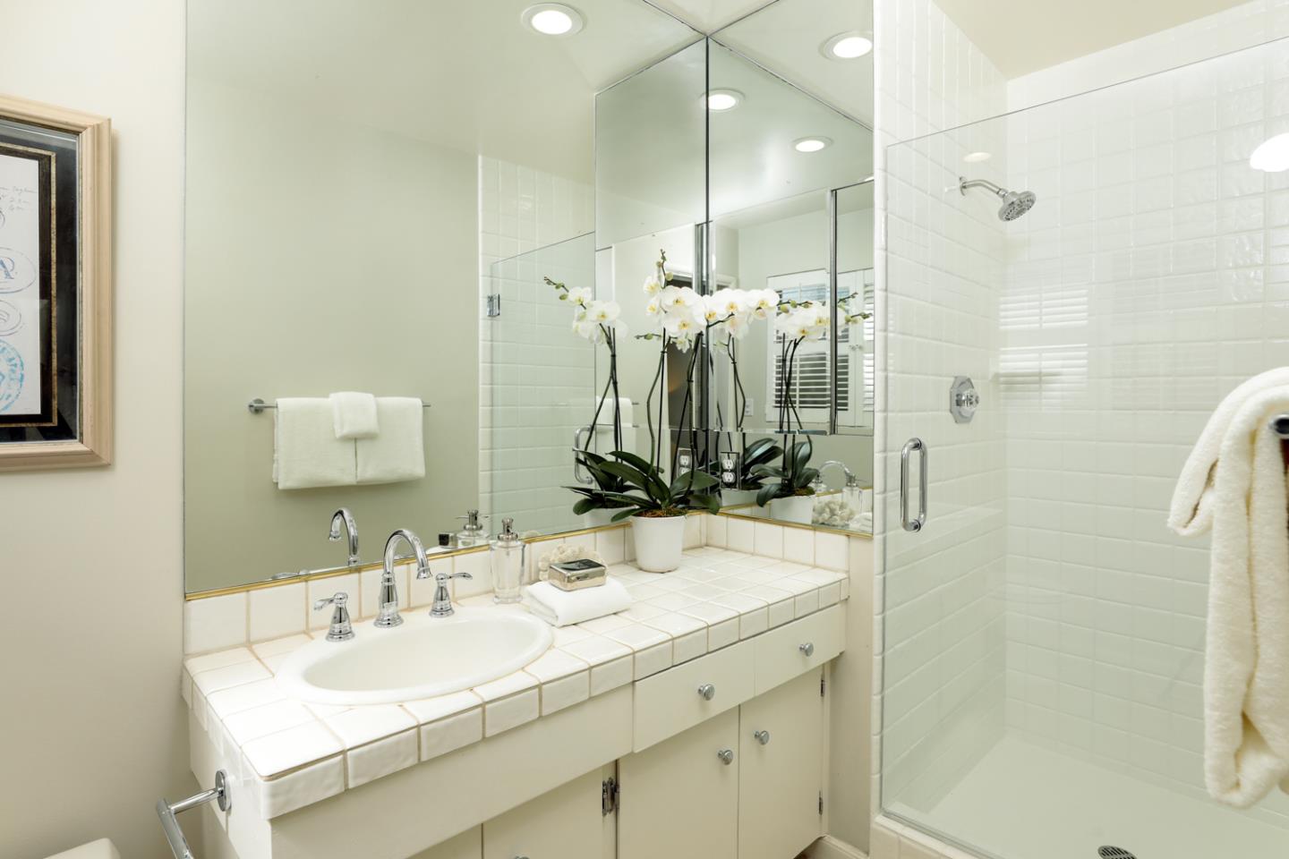1869 Appletree Lane Mountain View, CA 94040 - Photo 19 of 35 a bathroom with a double vanity sink mirror and shower