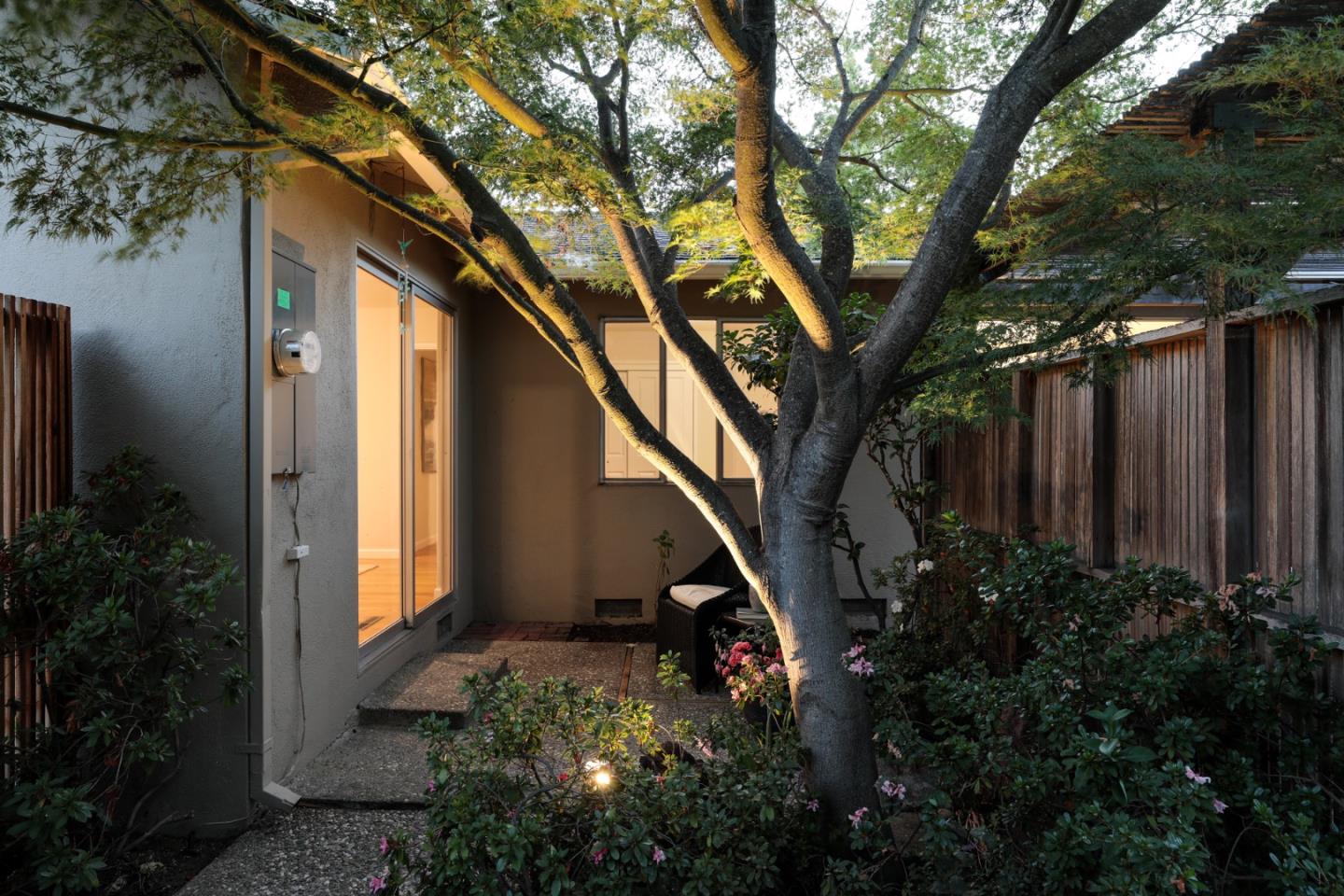 1869 Appletree Lane Mountain View, CA 94040 - Photo 20 of 35 a backyard of a house with lots of green space