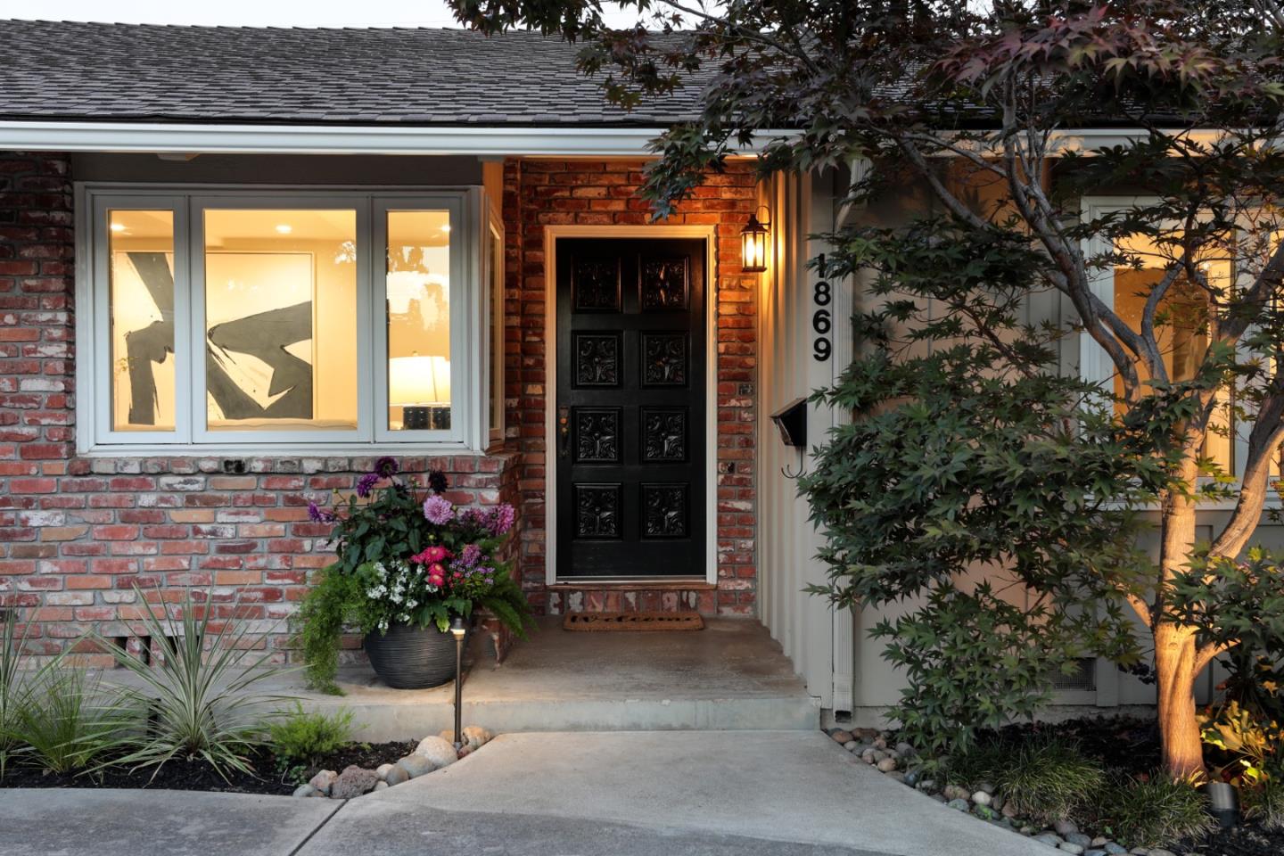 1869 Appletree Lane Mountain View, CA 94040 - Photo 3 of 35 a front view of a house with a blue gate