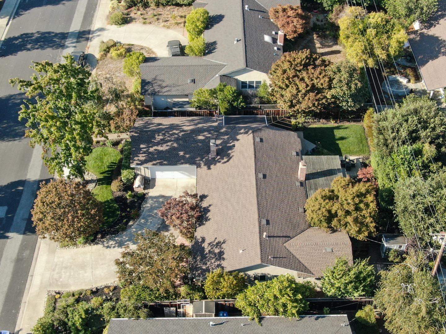 1869 Appletree Lane Mountain View, CA 94040 - Photo 32 of 35 an aerial view of a house with a yard and garden