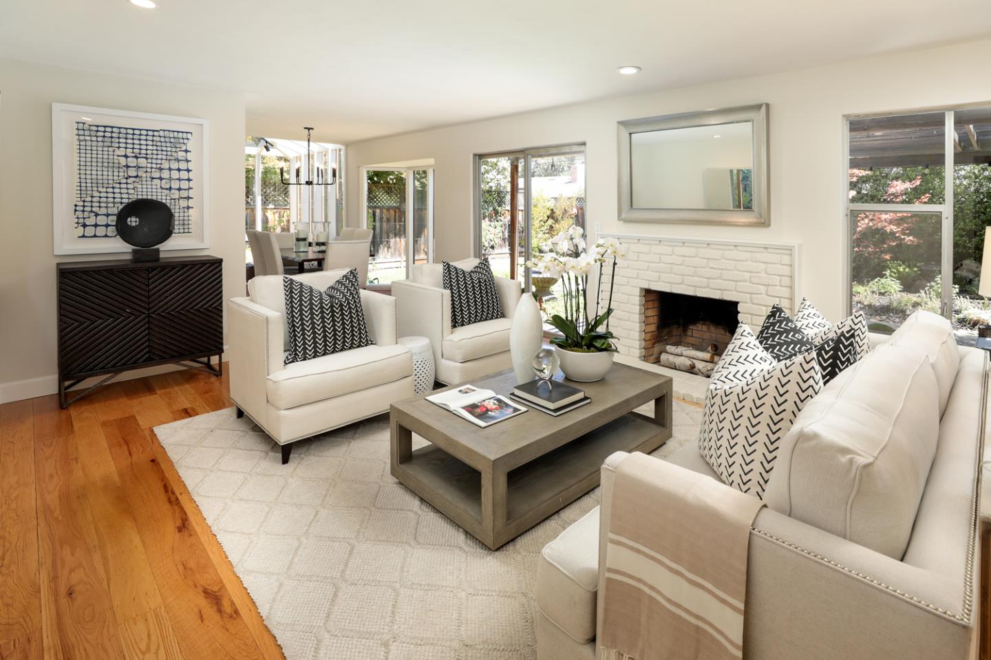 1869 Appletree Lane Mountain View, CA 94040 - Photo 5 of 35 a living room with furniture and a fireplace