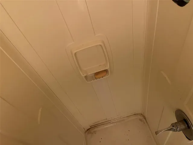 a room with furniture and stairs