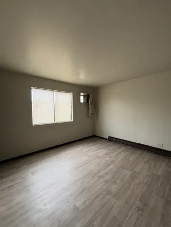 an empty room with windows