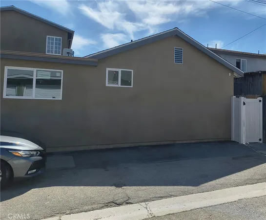 a car parked in front of a house