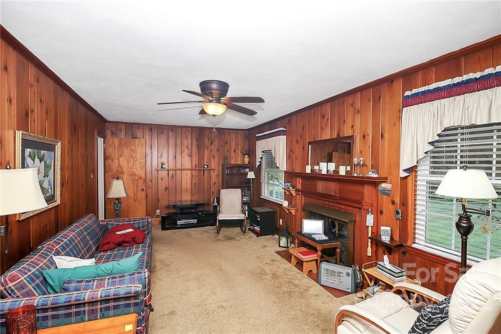 4114 Murrayhill Road Charlotte, NC 28209 - Photo 11 of 28 a living room with furniture and a window