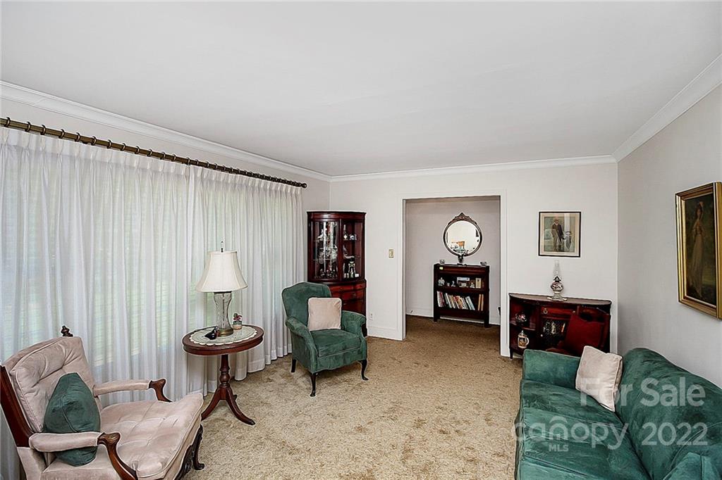4114 Murrayhill Road Charlotte, NC 28209 - Photo 14 of 28 a living room with furniture and a wooden floor