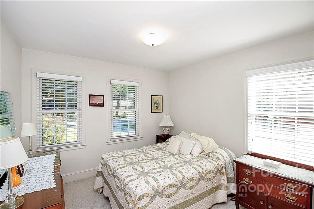 4114 Murrayhill Road Charlotte, NC 28209 - Photo 20 of 28 a bedroom with a bed and window