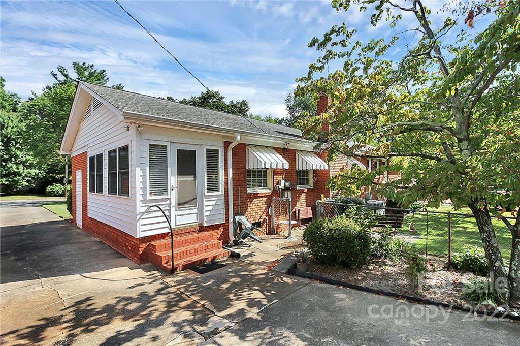 4114 Murrayhill Road Charlotte, NC 28209 - Photo 2 of 28 a view of a house with a yard