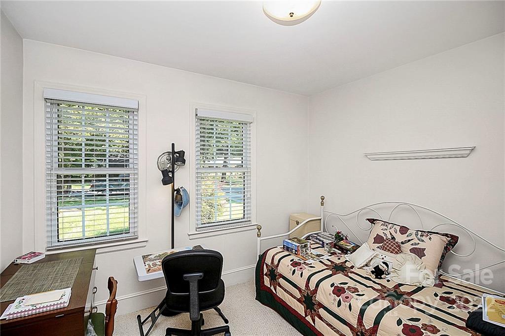 4114 Murrayhill Road Charlotte, NC 28209 - Photo 22 of 28 a bed room with furniture and a window