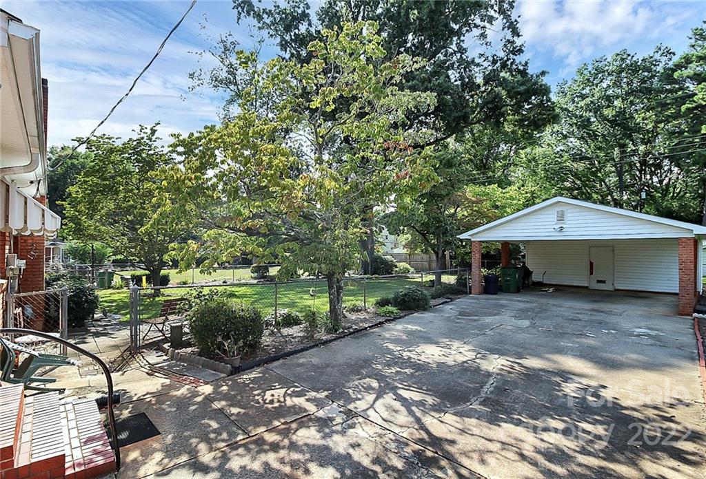 4114 Murrayhill Road Charlotte, NC 28209 - Photo 25 of 28 a front view of a house with garden