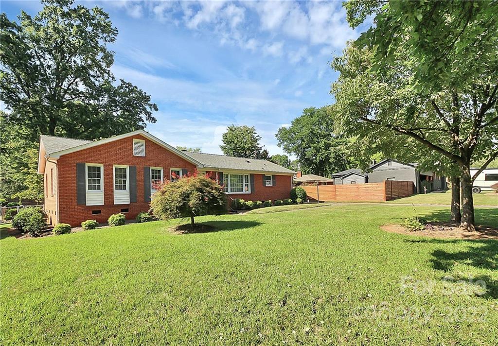 4114 Murrayhill Road Charlotte, NC 28209 - Photo 5 of 28 a front view of a house with yard and green space