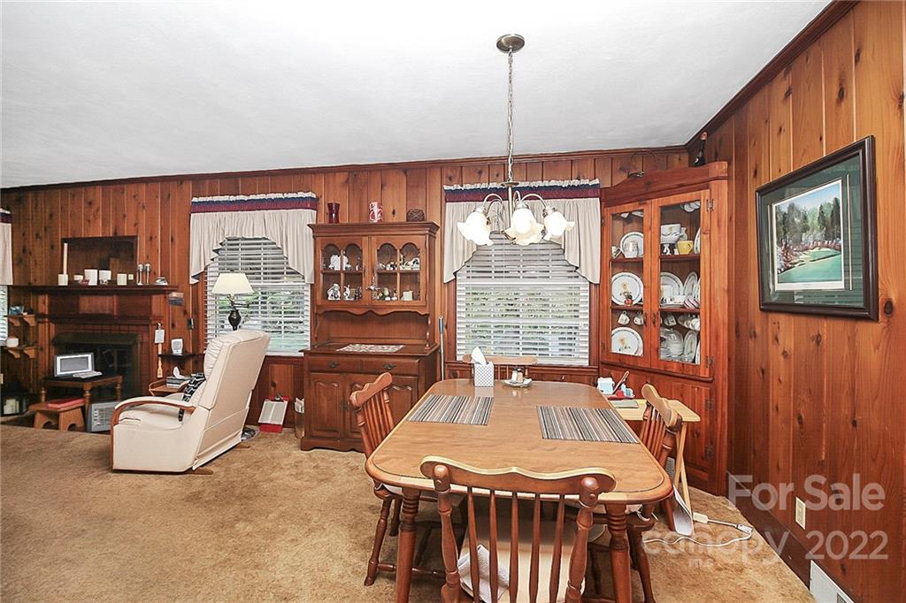 4114 Murrayhill Road Charlotte, NC 28209 - Photo 9 of 28 a view of a dining room with furniture window and outside view