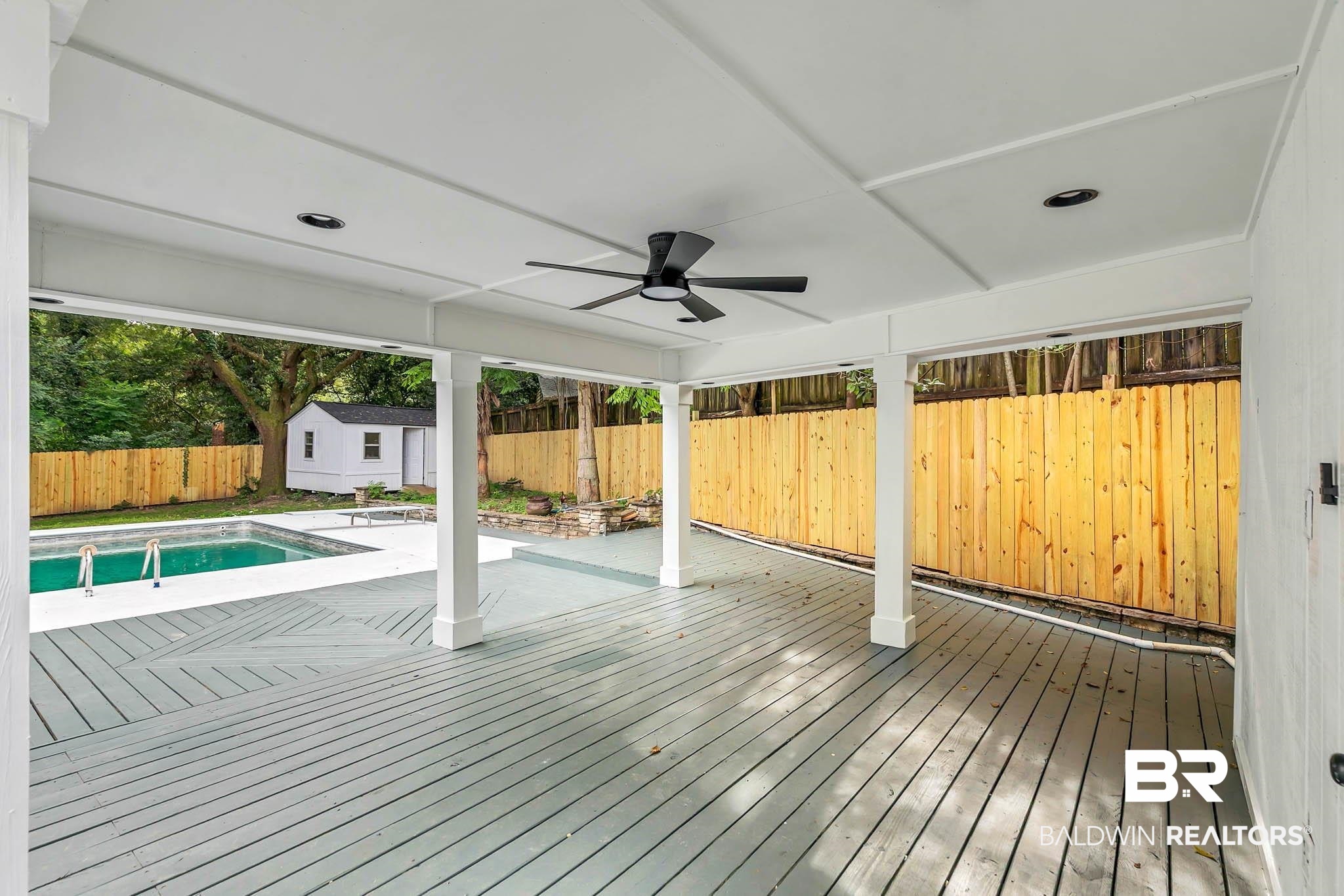 4705 Sherry Court Mobile, AL 36693 - Photo 69 of 100 Deck with a fenced backyard, a storage unit, ceiling fan, and a patio area