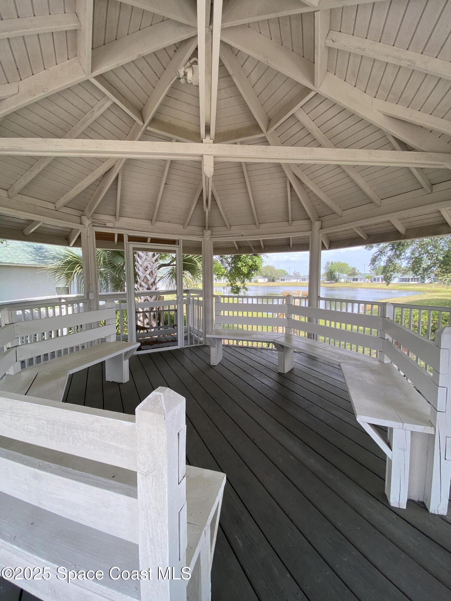 3847 Town Square Boulevard, Unit 30 Melbourne, FL 32901 - Photo 16 of 36 a view of outdoor space with seating area