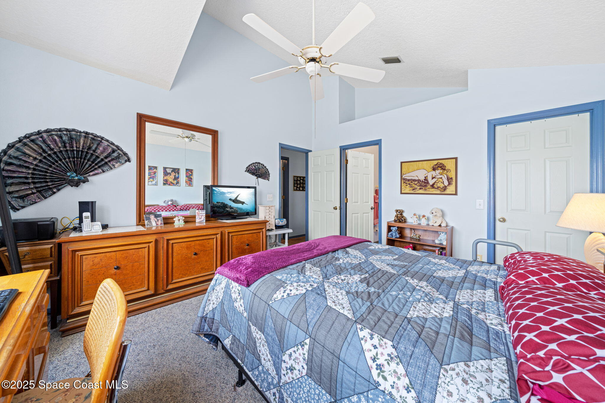 3847 Town Square Boulevard, Unit 30 Melbourne, FL 32901 - Photo 31 of 36 a bedroom with bed and a window