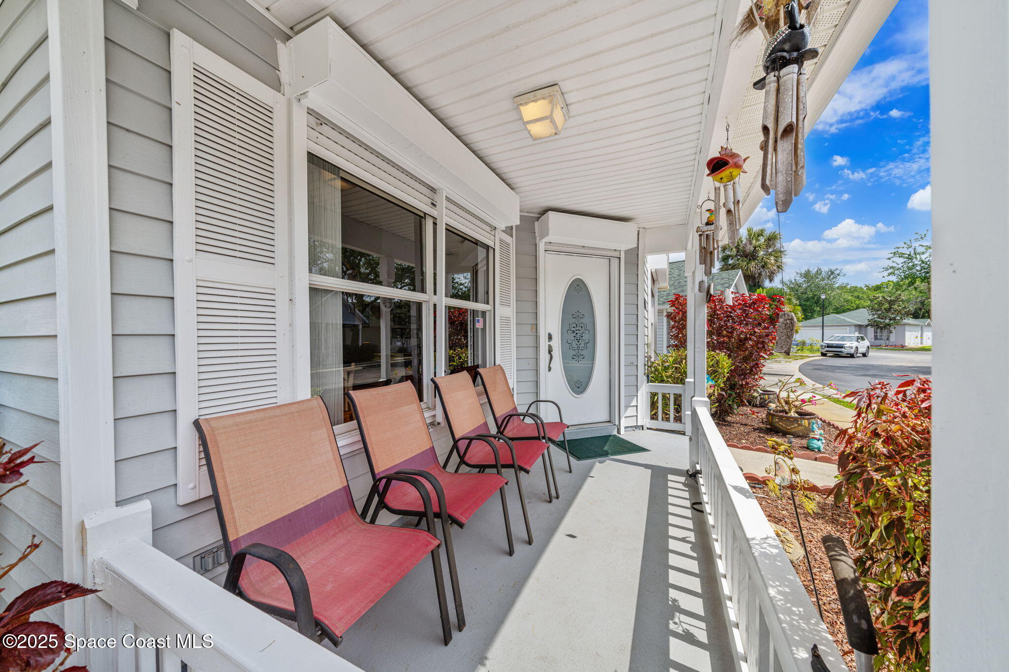 3847 Town Square Boulevard, Unit 30 Melbourne, FL 32901 - Photo 5 of 36 a building outdoor space with patio furniture