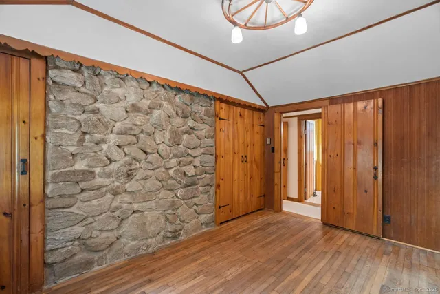 a view of entryway with wooden floor