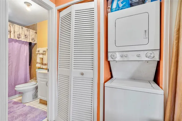 a view of bathroom with a toilet and a shower