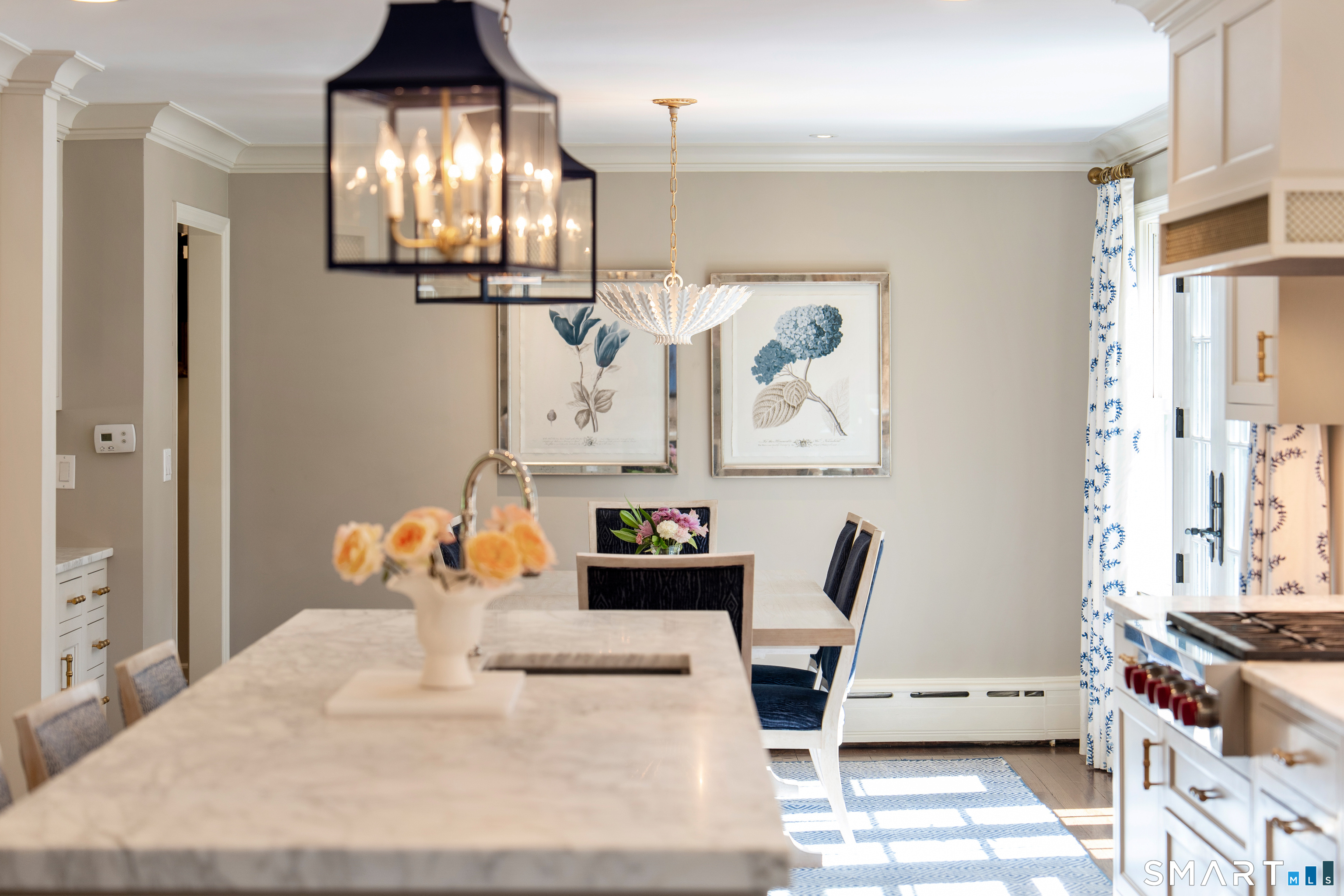 11 McLaren Road South Darien, CT 06820 - Photo 13 of 40 a bedroom with furniture and a chandelier