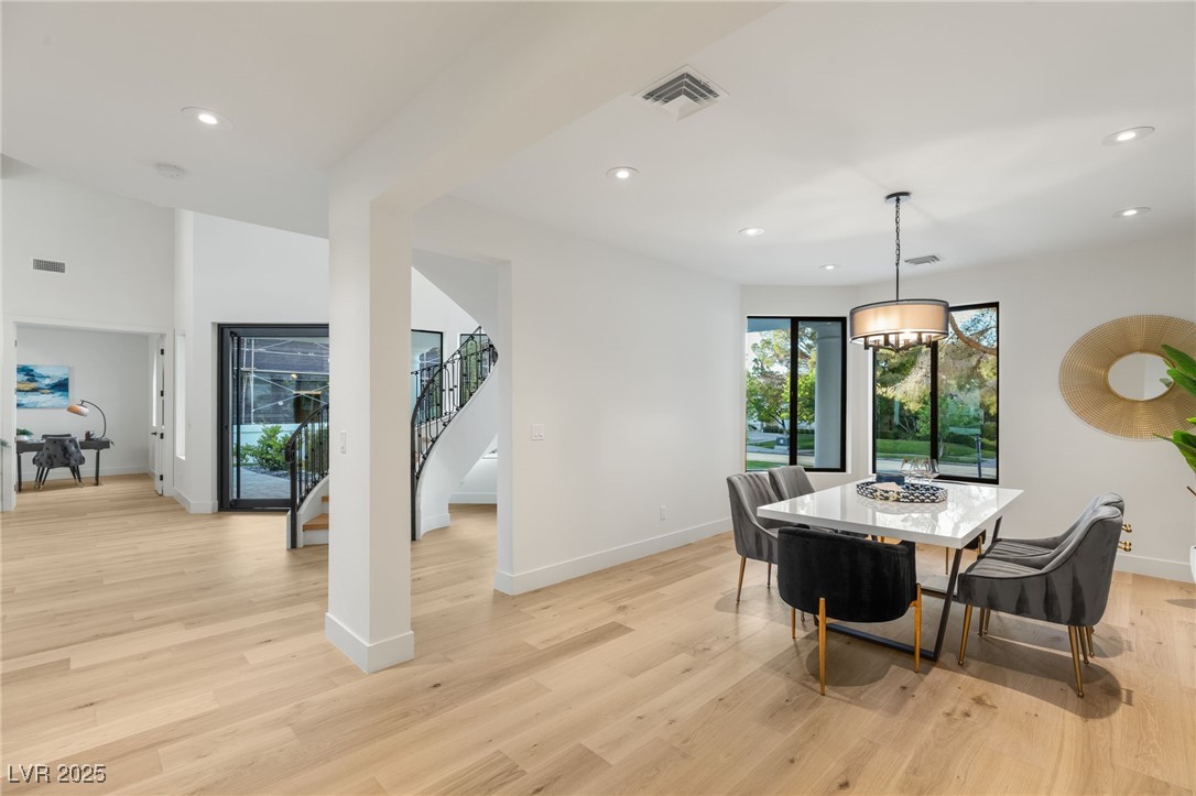 2316 Prometheus Court Henderson, NV 89074 - Photo 11 of 92 Dining room with light wood-type flooring, baseboards, recessed lighting, stairway, and visible vents